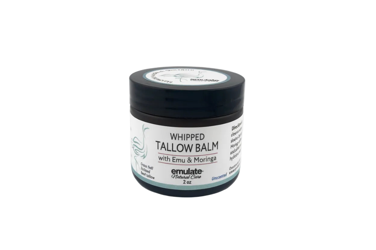 jar of whipped tallow balm on a light gray background