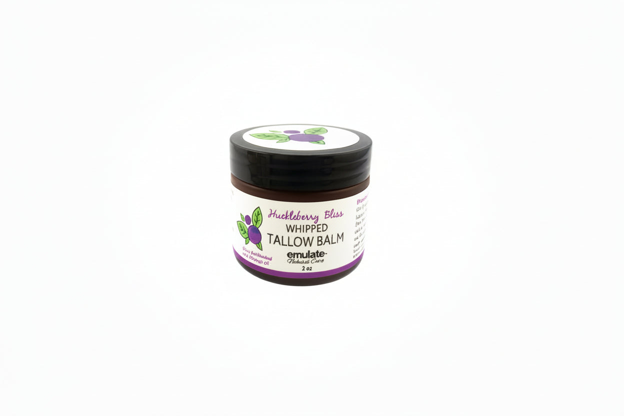 Jar of tallow balm with a purple label on a white background