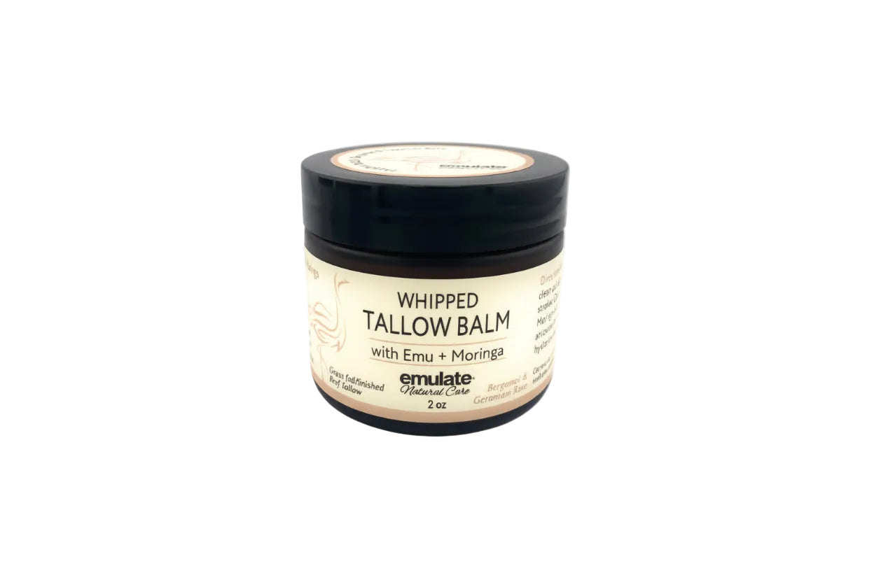 Jar of rose whipped tallow balm on a white background