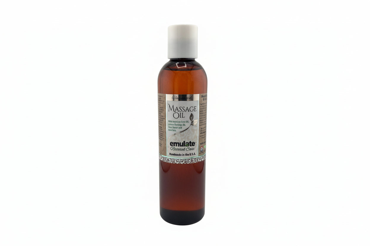 Bottle of massage oil on a white background