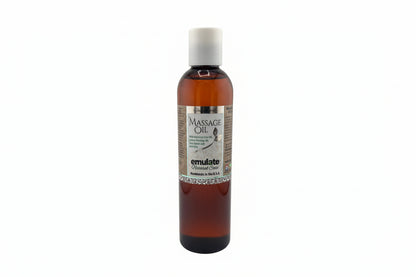Bottle of massage oil on a white background