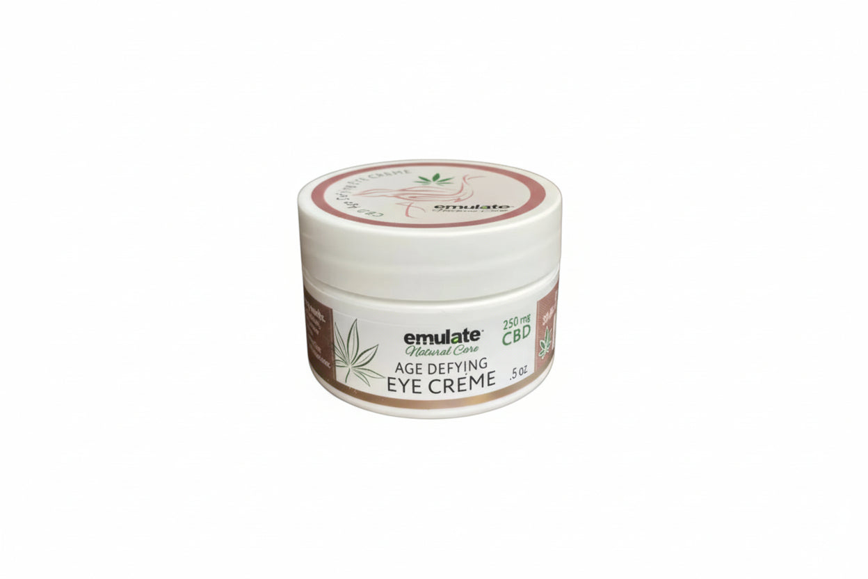 Jar of emulate Natural Care age-defying CBD eye crème on a white background